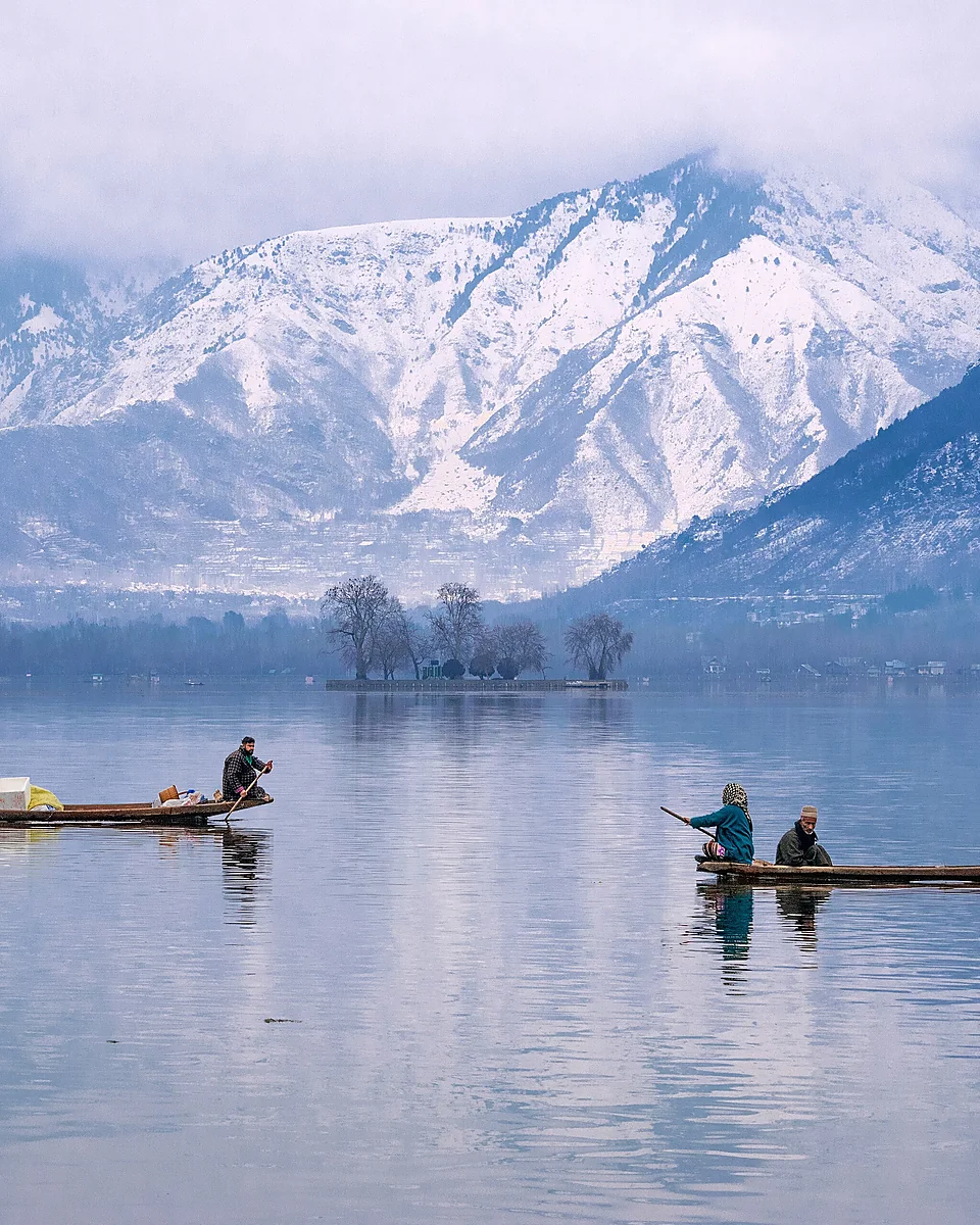 Snow-covered mountain peaks and an alpine valley in Kashmir; Kashmir Valleys & Mountain Days is customizable
